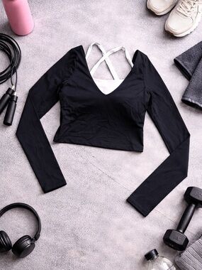 Black Long-Sleeve V-Neck Cropped Workout Top with White Strappy Back